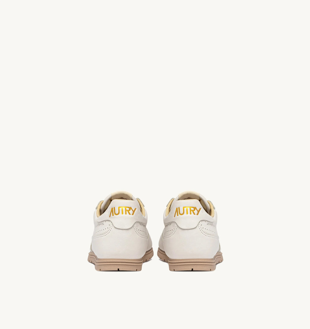 AUTRY <br> Baskets Windspin <br> Cuire Nappa Blanc et Or